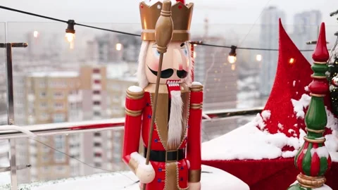 Outdoor terrace with large nutcrackers, festive decorations and decorated Stock Footage 325336904