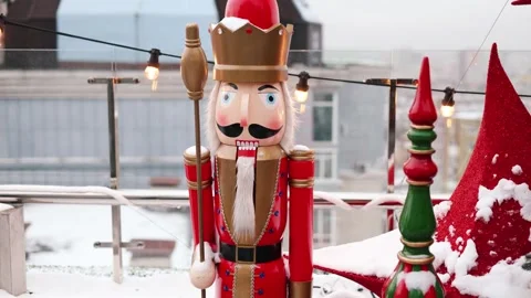 Outdoor terrace with large nutcrackers, festive decorations and decorated Stock Footage 325336932