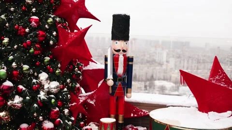 Outdoor terrace with large nutcrackers, festive decorations and decorated Stock Footage 325336945