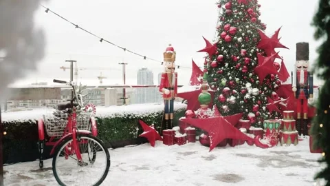 Outdoor terrace with large nutcrackers, festive decorations Stock Footage 325612499