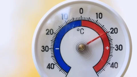 Outdoor thermometer shows rapid fall of temperature from warm to subzero Stock Footage 117249133