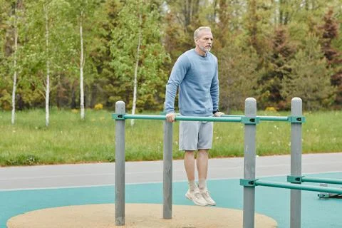 Outdoor Workout On Parallel Bars Stock Photos