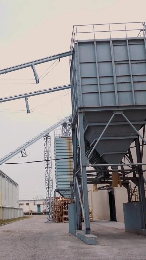 Outdoors, factory on processing of grain crops, such as corn, grain, sunflower, Stock Footage 318808785