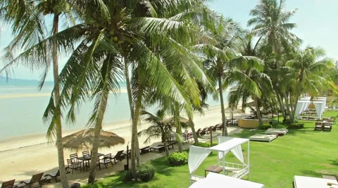 Outdoors lounge zone at the beach Stock Footage 64291857