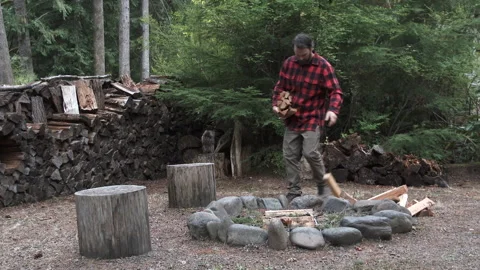 Outdoors Man Building Camp Fire Stock Footage 318045467