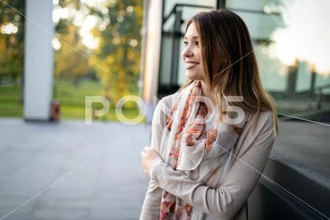 Outdoors portrait of beautiful young girl laughing Stock Photos