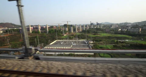 Outdoors view from bullet train riding in central China, development and rural Stock-Footage 322098845