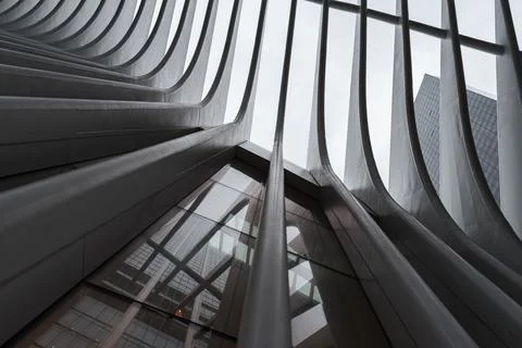 Outer facade of the Oculus train station under a cloudy sky - suitable for wallp Stock Photos
