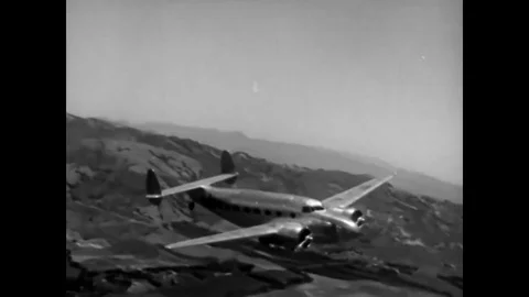 The outer part of an airplane wing is built and inspected inside a Lockheed Video stock 83141815