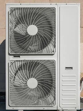 Outer part of the wall-mounted split air conditioner Stock Photos