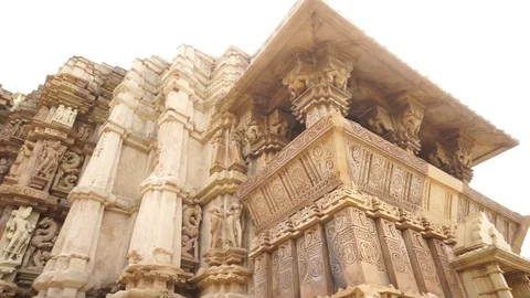Outer structure of the temples in the Khajuraho showing beauty of old Video stock 111217859