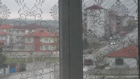 The outer view from the window and curtain openings, the view out the window, Vídeos de archivo 153358852