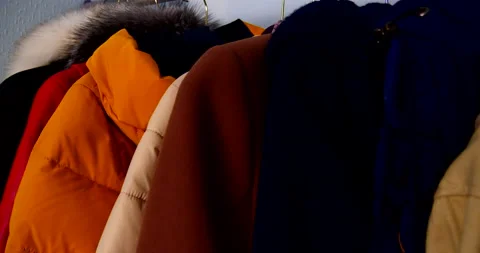 Outerwear on a hanger jacket coat close-up video 4k Stock Footage 143125010
