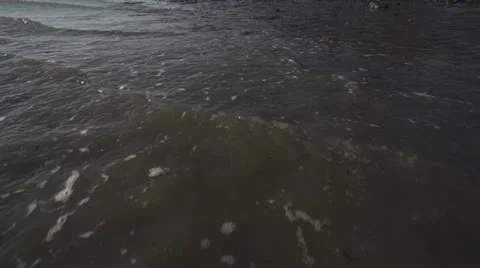 Outgoing Low Tide Low Angle Close Stock Footage 12395700