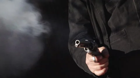 Outlaw fires revolver Stock Footage