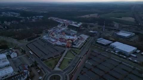 Outlet center and empty parking lots on a cloudy day. Nice aerial view drone Stock Footage 344619067