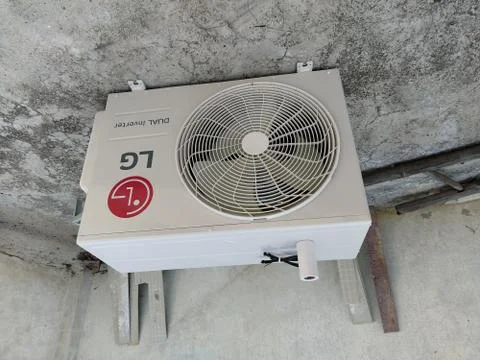 Outlet of an split air conditioner kept on the roof top. Stock Photos