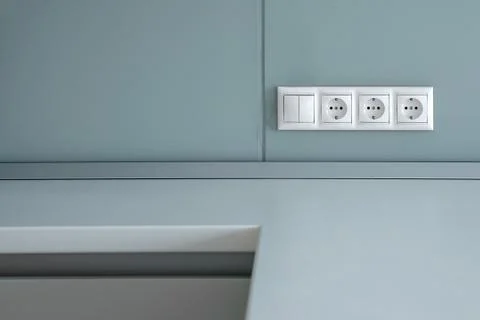 Outlet with a switch on the wall Stock Photos