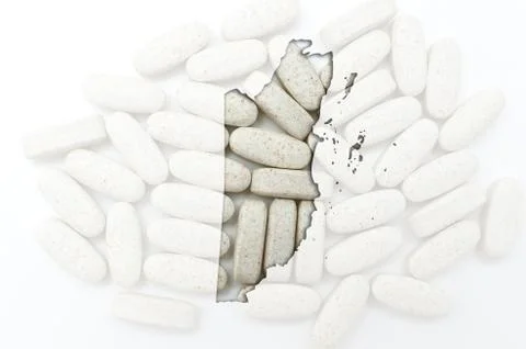 Outline map of belize with pills in the background for health and cure Stock Photos