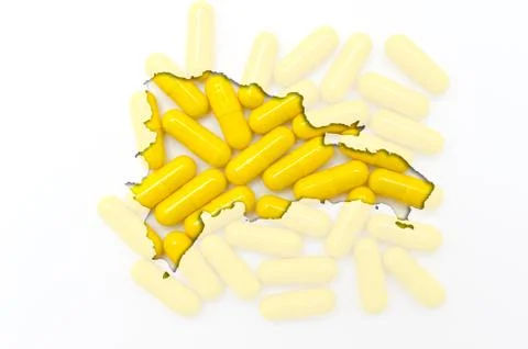 Outline map of dominican republic with pills in the background for health and Stock Photos