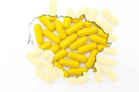 Outline map of lithuania with pills in the background for health and cure Stock Photos