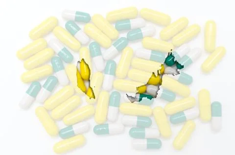 Outline map of malaysia with pills in the background for health and cure Illustrazione stock