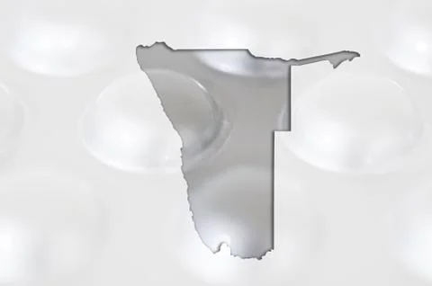 Outline map of namibia with pills in the background for health and cure Stock Photos