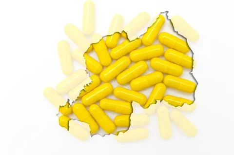 Outline map of rwanda with pills in the background for health and cure Stock Photos