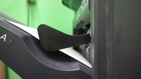 The output of printed sheets from the printer. printing documents in the office Stock Footage 143273688