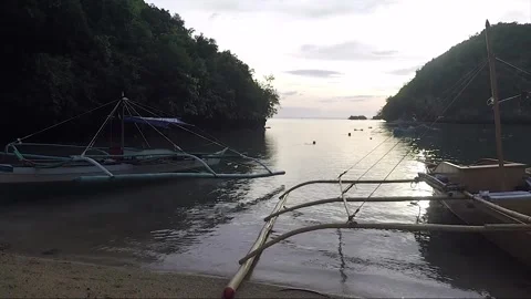 Outrigger Boats on Empty Sandy Beach, Sipalay, Negros island, Philippines Stock Footage 336616989