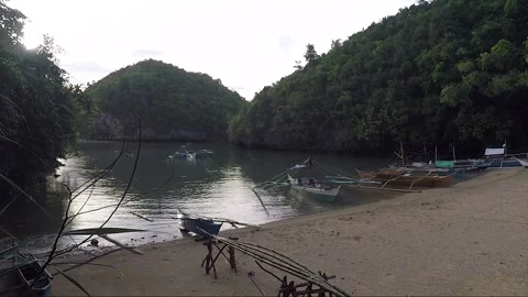 Outrigger Boats on Empty Sandy Beach, Sipalay, Negros island, Philippines Stock Footage 336621530