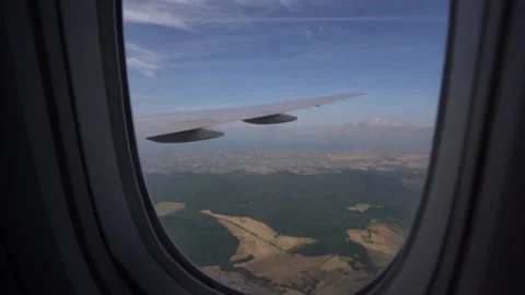 Outside airplane window over beautiful mountains Vídeo Stock 197630694