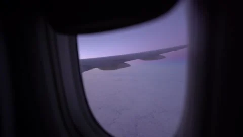 Outside of Airplane window at sunrise Vídeo Stock 197630693