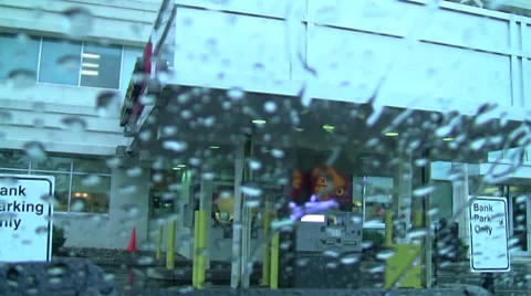 Outside bank rain1a Stock Footage 8557100