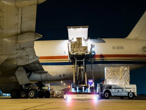 Outside cargo plane loading Stock Footage 74019625