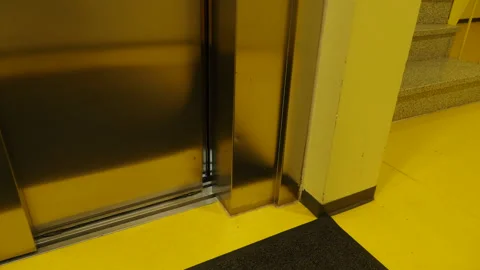 Outside elevator. Waiting the door to close and open. Stock Footage 131730807