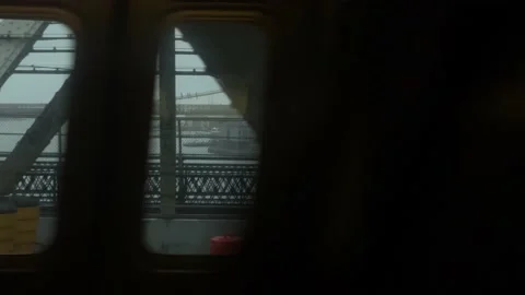 Outside glimpses of Manhattan Bridge through dark tunnel New York City 스톡 동영상 165228239