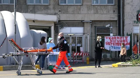 Outside hospital emergency room with ambulances, corona virus, covid 19, Genoa Stock Footage