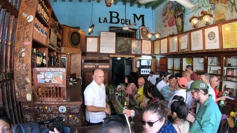 Outside the La Bodeguita del Medio bar in Havana, Cuba Stock Footage 90919986
