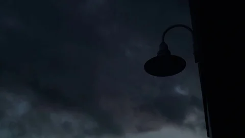 Outside Lamp Turning on at Night Stockbeeldmateriaal 85438466