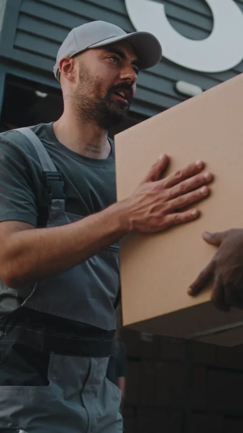 Outside of Logistics Retail Warehouse: Diverse Employees Unloading Cardboard Vídeo Stock 312271889