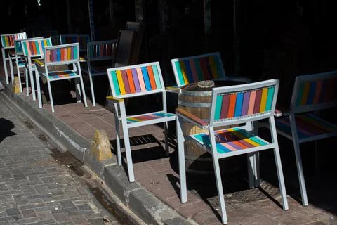 Outside restaurant or cafe. Empty seats, chairs near table. Stock Illustration