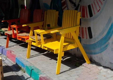 Outside restaurant or cafe. Empty seats, chairs near table. Stock Photos