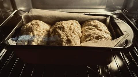 Outside seeing Blurred of Final proof dough lined with  parchment paper is .. Stock Photos
