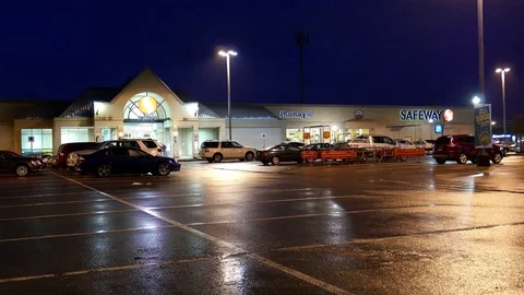 Outside shot of Safeway store at raining night in Port Coquitlam BC Canada Stock Footage 73395565