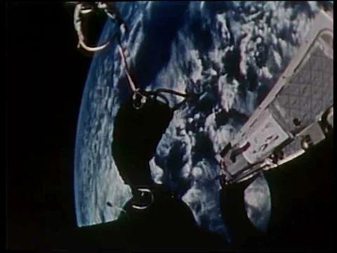 The outside of a space capsule is shown with photographic stills as well as the Stock Footage 75287530