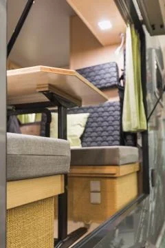 Outside standing and looking through a window of a caravan Stock Photos