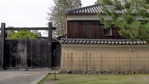 Outside of the temple, wall built by wooden Stock Footage 96990145