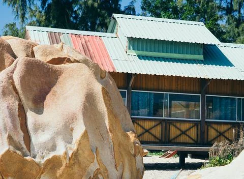 Outside view facade. Wood yellow boards material country house, panoramic window Stock Photos