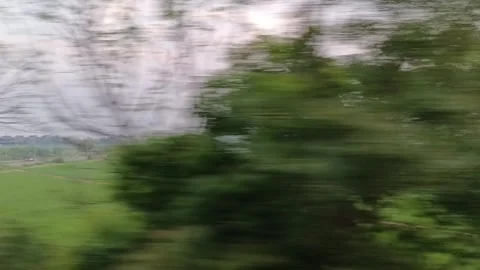Outside view of fields from inside of train Stock Footage 340193228